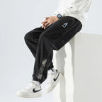 Men's Tapered Denim Joggers Featuring Panelled Seams And Elastic Waist