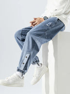 Men's Tapered Denim Joggers Featuring Panelled Seams And Elastic Waist